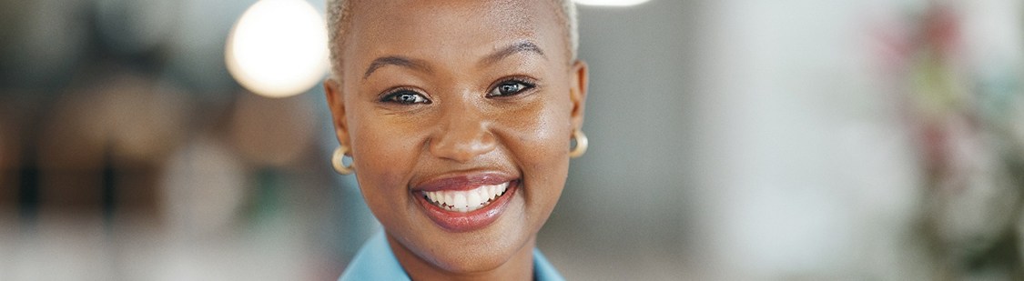 Smiling woman with blue business jacket